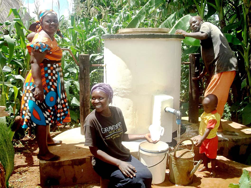 Villagers using one of AquaAids Elephant Pumps